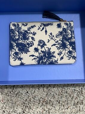 IPSY glam bag — blue floral pattern